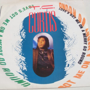T.C. Curtis - Love's Got Me On A Merry Go Round (12", Single)