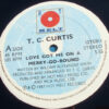 T.C. Curtis - Love's Got Me On A Merry Go Round (12", Single) - 画像 (3)